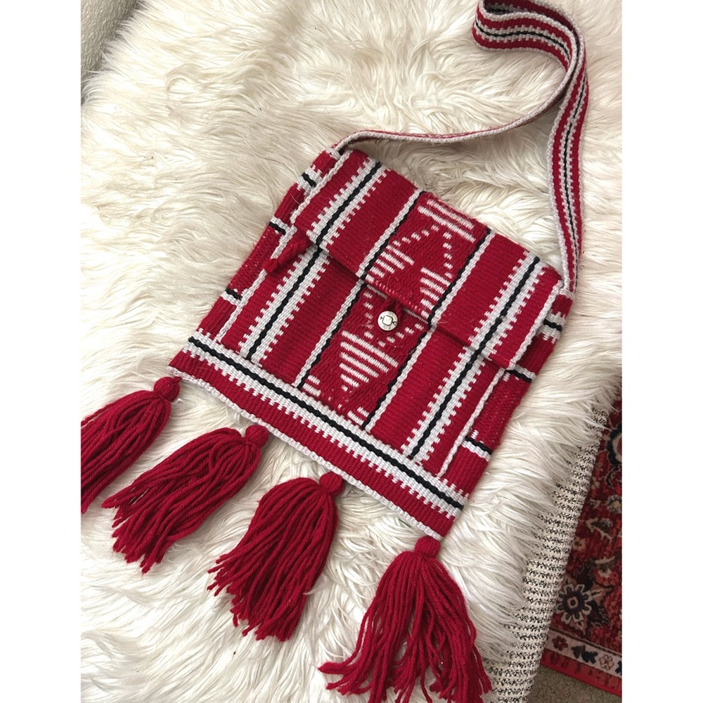 Woven tribal knit shoulder bag with large fringe tassels